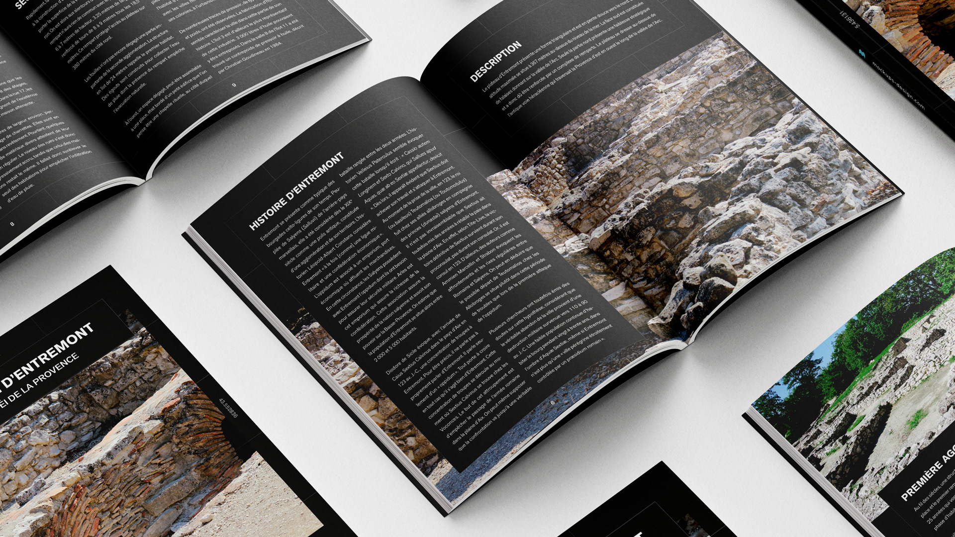 Several opened explanatory books of the exhibition