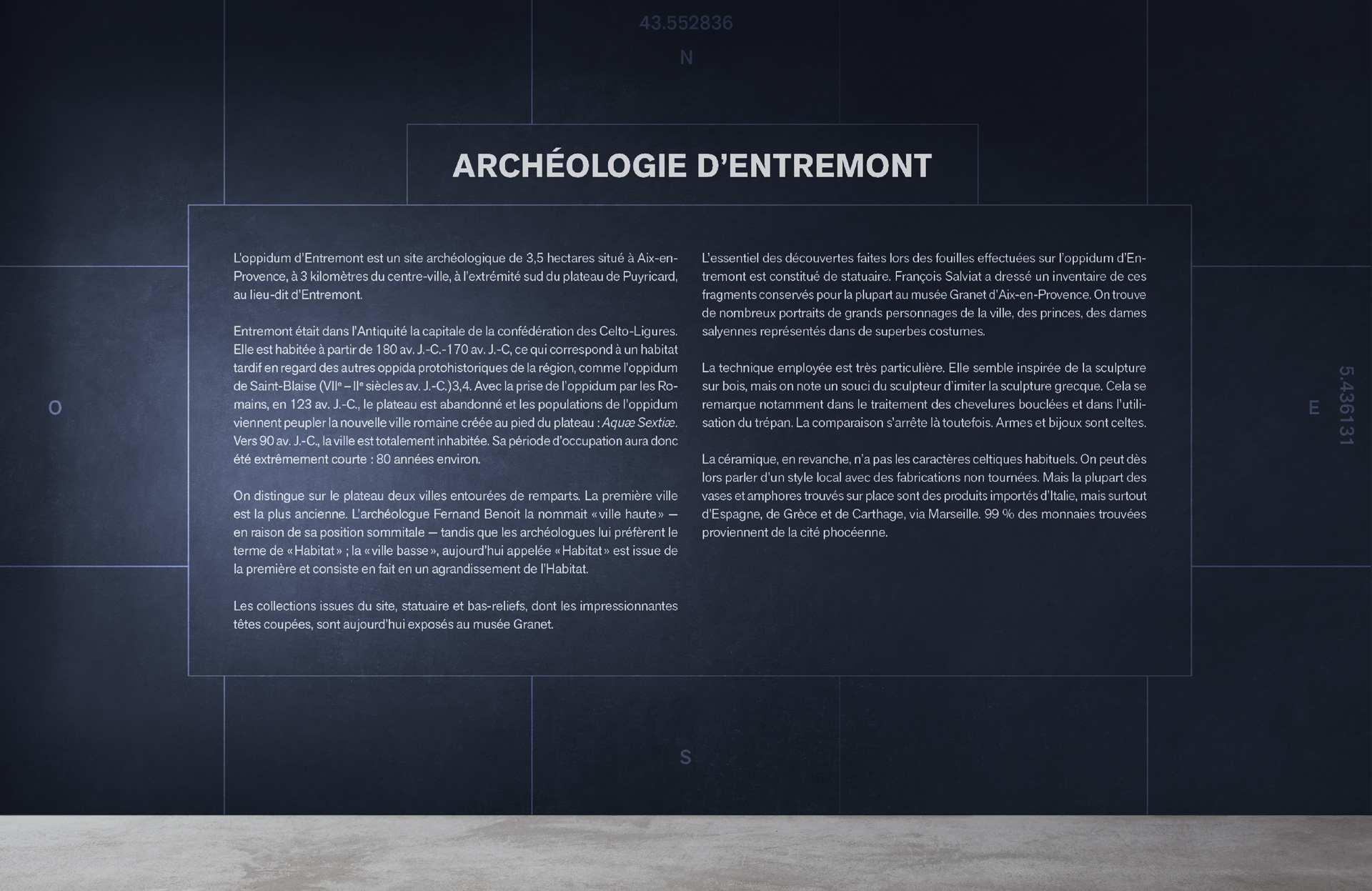 Black exhibition wall with presentation text of the exhibition