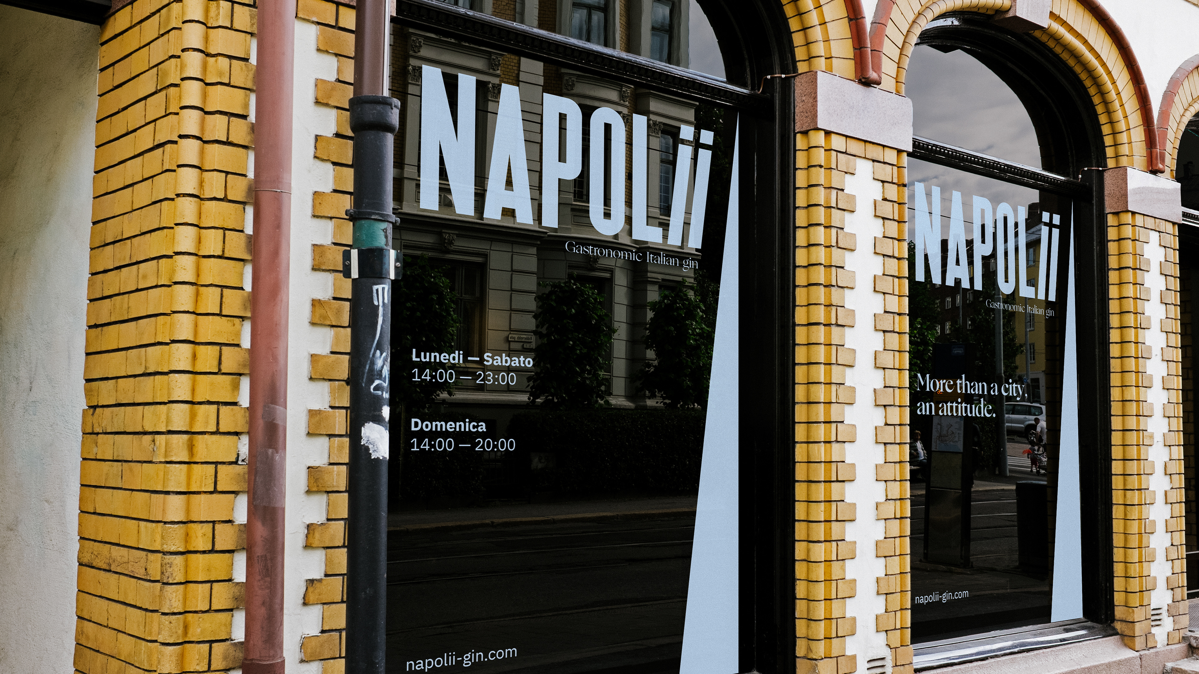 Store front with Napolii logo and opening hours