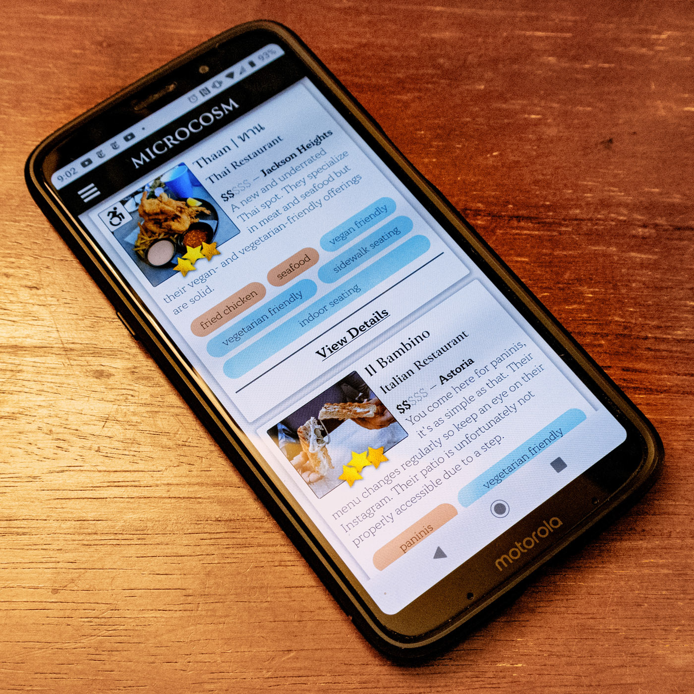 Photo of the microcosm website displayed on a phone