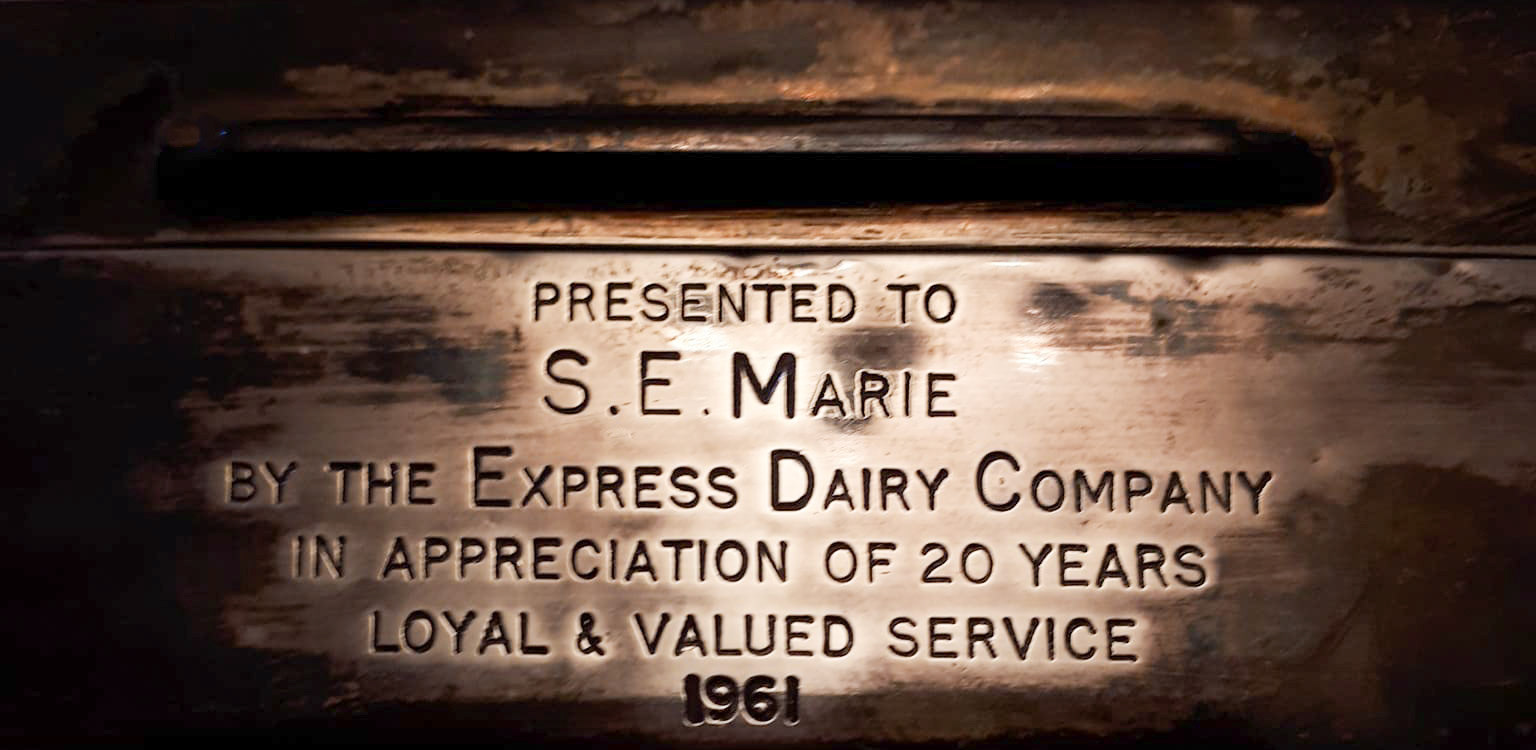 1991 Sid Marie, milkman at Northwood Depot retired after 50 years. Christine Kempster, his daughter, comments "Dad's long service awards-the red tie was 45 years I think. I spent many hours as a child polishing the silver cigarette box! I have all his long service awards...badges and ties with the little train motif, a silver cigarette box and my brother has a watch."