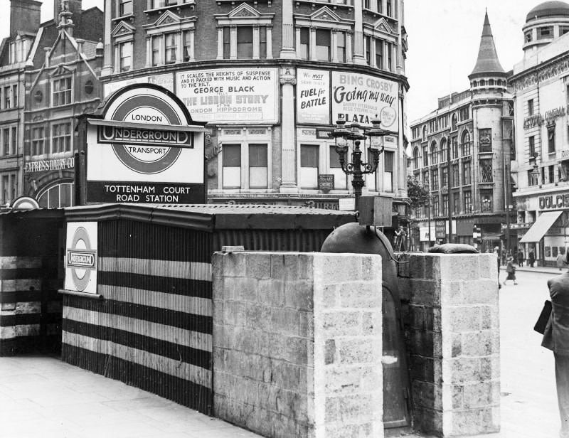 1944 Tottenham Court Road station protected by blast wall during the second world war. Express Dairy Co building, probably a shop, on the left. (Courtesy London Transport Collection)