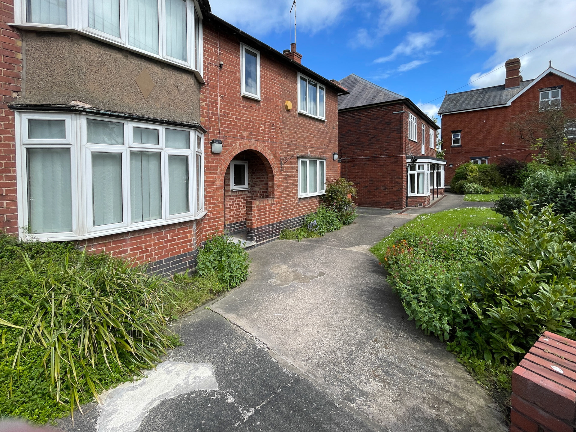 2023 Muller Minsterley. Nick Gurden comments "We used to live in the house next to the garage for several years when my Dad was Manager, before being transferred to the Frome plant around 1962"