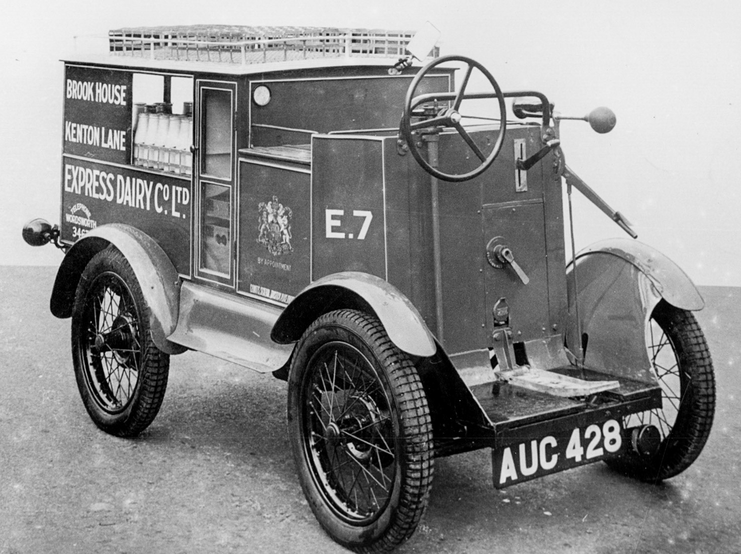 1920's? Brook House, Kenton Lane-Very early electric float E7, AUC 428. Depot probably near Brazier's Farm. (Courtesy Dave Fane)