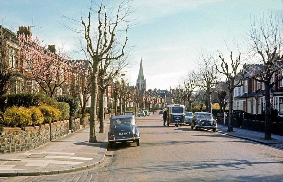 1967 Muswell Hill round in Grand Ave, Muswell Hill, London. Ian Pearce comments "I could have been on that milk float as a milk boy. Delivered milk, sold groceries and collected money - customers often left the money in an envelope in the empty to be collected!". John Bushby added "I probably worked on that Wales &amp; Edwards milk float too...worked for Express Dairy then". (Courtesy Len Mclondon/ Paul Smith)