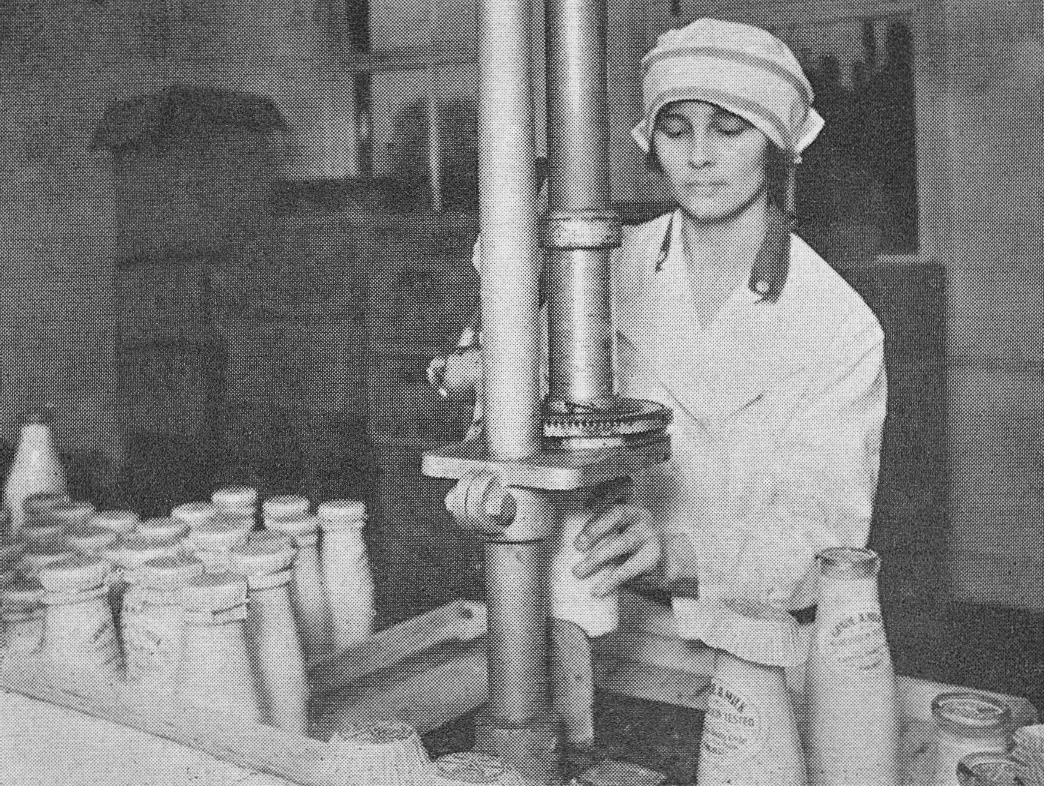 1922 College Farm. Grade A milk produced and farm bottled at Finchley. The neck of the bottle was first sealed with a cardboard disc and then an over-lapping paper cap was crimped on top. (1960 Picture Set from Express News Christmas edition)
