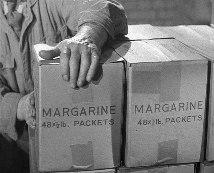 1940's Tower Creameries, later Mitcham Foods, part of Express. Boxing. (Courtesy British Instructional Films, British Pathé)