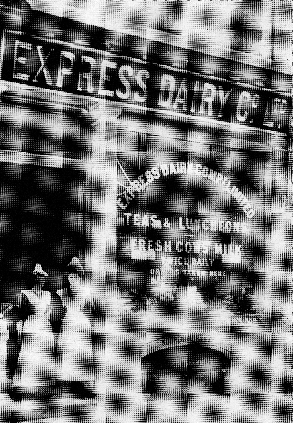 1908 Express Shop, probably 85 Queen Street, Cheapside, where Koppenhagen &amp; Co, Cigar Importers and Pipemakers, were based in the 1900's. Lady on the right identified as Beatrice May Warren, by her grand-daughter Angela Masters.  (January Express News)