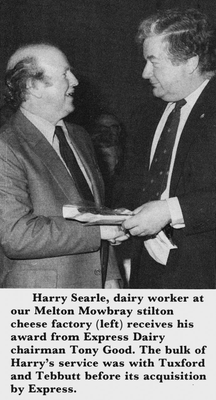 1982 Harry Searle from Tuxford &amp; Tebbutt receives 50 year award from Tony Good. (Express News February)
