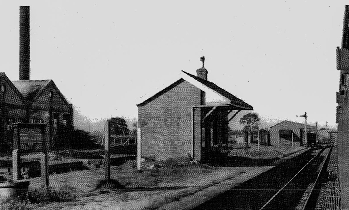 1960's Pipe Gate Station, with creamery and siding on the left. Henry Edwards & Son had a creamery with private siding access at Pipe Gate station. During the 1930's this creamery made use of road-rail tanks which were dispatched to the company's bottling plant near Kensington Olympia, taken over by Express in 1950. Milk trains were worked via the LMS line as far as Market Drayton where they were picked up by the GWR and then ran to London via Wellington. (Courtesy Matthew Pinto, Milk on the Rails)