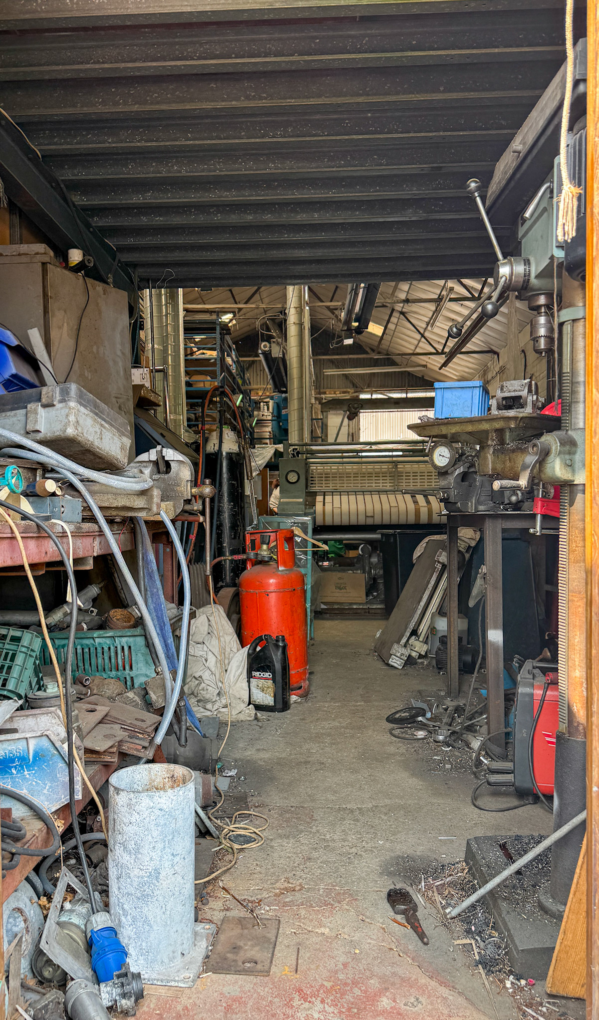 2025 August 05, Billingshurst Station-inside one of the industrial buildings still in use. (Express Dairy Tales collection)