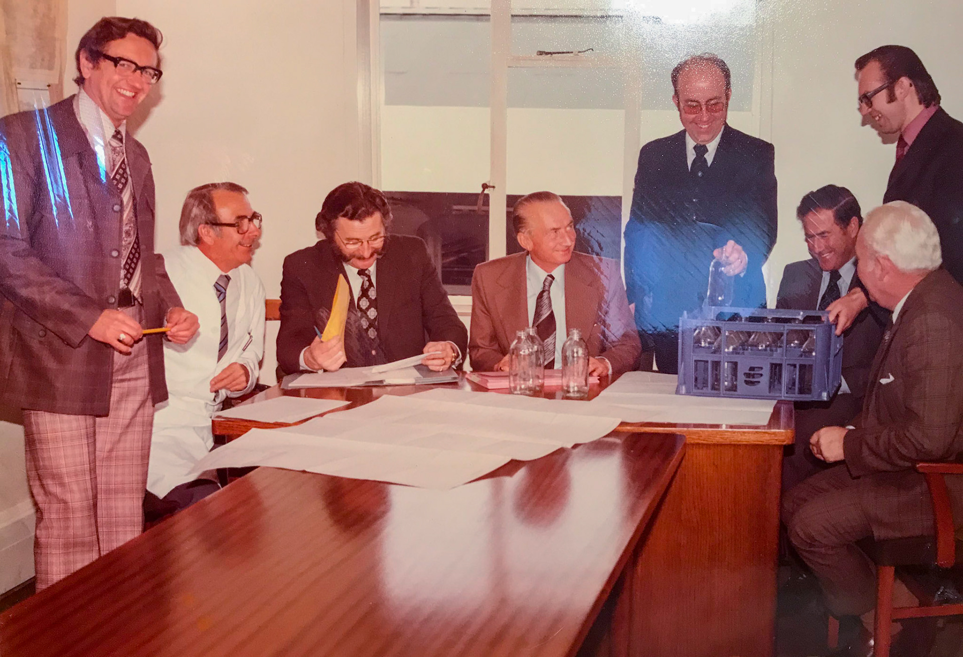 1980's Exeter, John Bowden standing, first left. George Streeting, then Peter Perry, Stan Wheeler, Vic Poore. Looks like a meeting to discuss the 'Pintie' changeover. Chris Massey (Technical Manager) standing, fifth from left.John Roberts, standing far right. (Courtesy Lindsey Cannon)