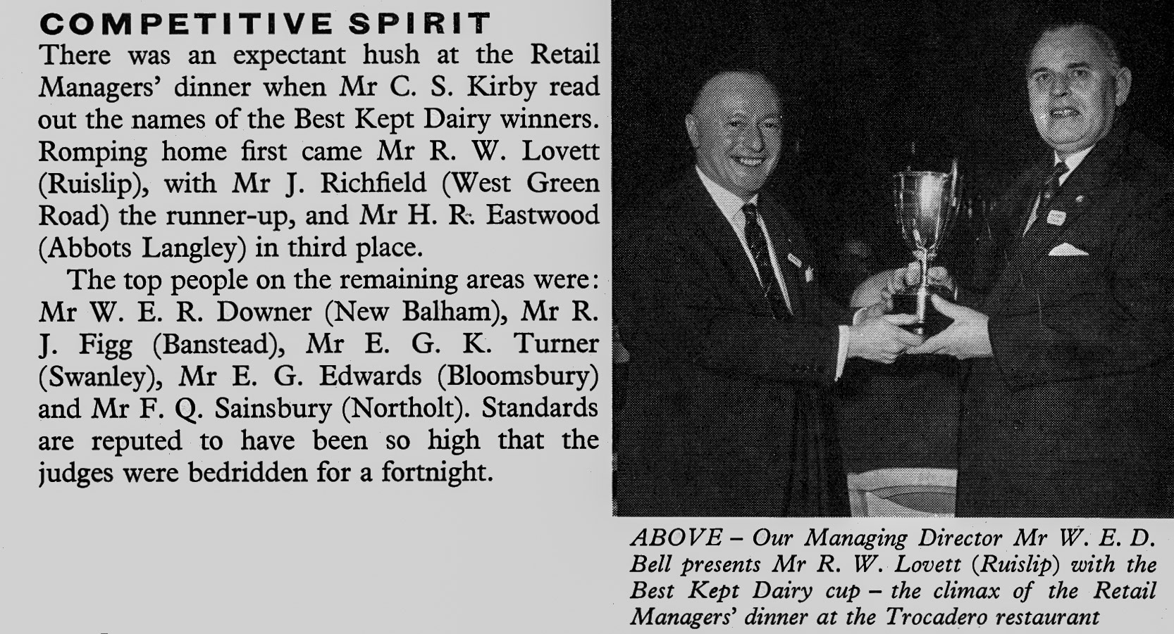 1960 Retail Managers Dinner, with W.E.D. Bell presenting the Best Kept Dairy cup to Mr R. W. Lovett (Ruislip). (Express News Spring)