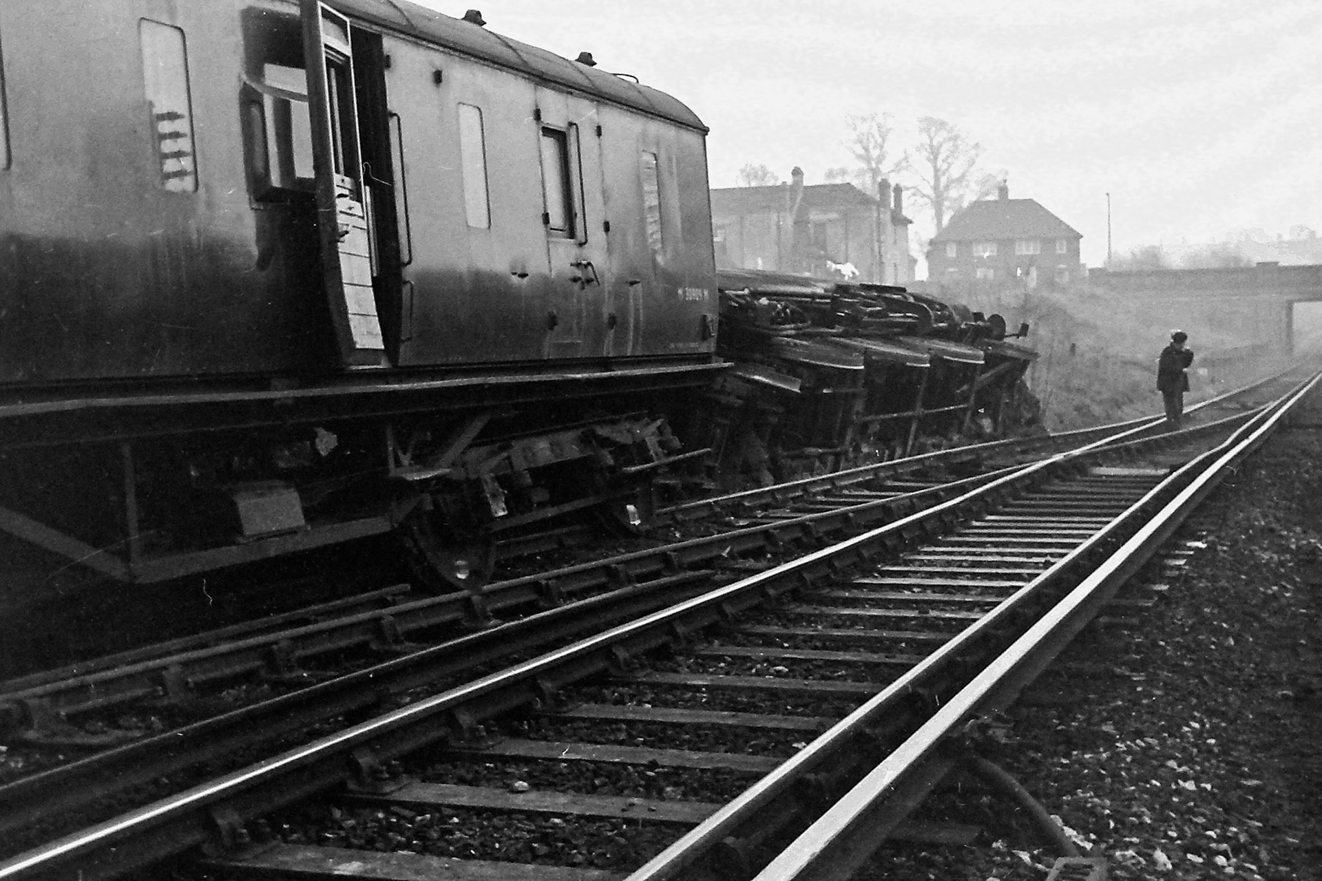 1966 South Morden. BR Standard Class 4 Tank 80141 jumped the points with a load of empty tanks, closing the line and siding for 48 hours. (Photographer Sam Jones)