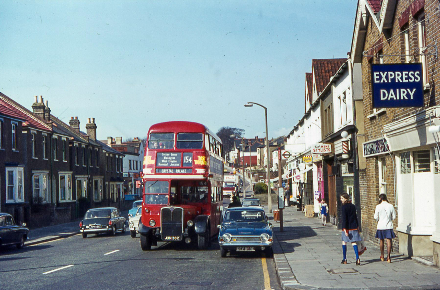 1973 Carshalton Depot, Carshalton Road/ Shorts Road. Mike Lodge comments "We got our milk from Express Dairy. Our milkman was Harry he used to deliver down Denmark Road/ Denmark Gdn flats, then part of River Gardens before turning round and going into Strawberry Lane. Then it was into The Causeway/ Mill Close, before returning to the other end of River Gardens, then Shepley Close and back to the depot. I used to help out during the summer holidays, meeting him in Denmark Gardens and finishing in Shepley Close. Friday was a long day as it was money collection day. Sometime in the early 60s, they changed to electric carts, so no more horses." (Courtesy John Parkin/Michael Sparey)