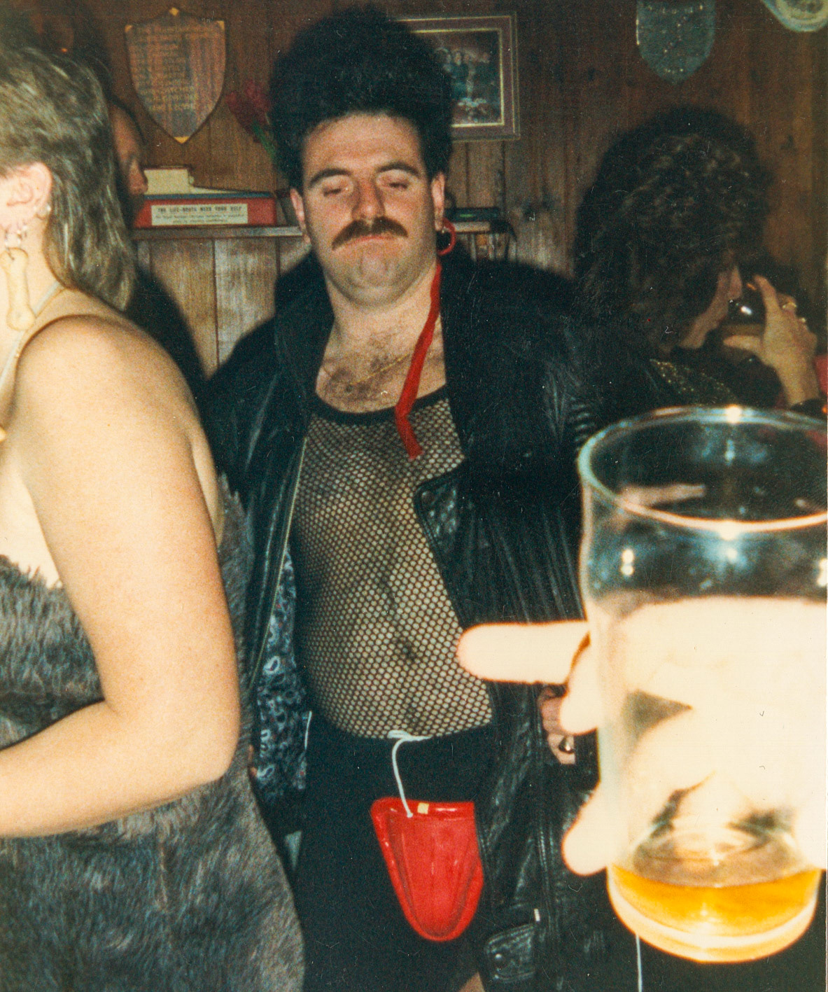 1988 Honiton staff (Chris Jarvis) celebrate the first Red Nose Day, Fountain Head Inn, Branscombe, Devon. (Courtesy Tim Pearce)
