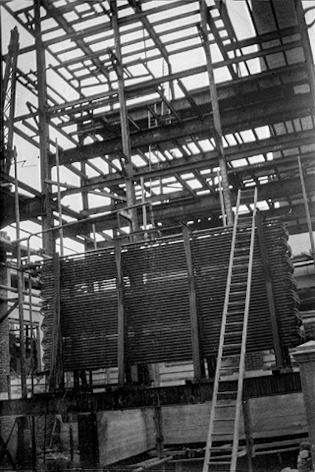 1930's Staplemead. Colin Carpenter comments "Photo found in an undeveloped film found in an old camera that shows the construction of the core building in, I would think, the 1930s judging by the dress of the worker shown. Amazing that they did so much with such little scaffolding in those days; rivetted RSJ's, cut Bath stone and brickwork would cost a fortune these days." (Courtesy Colin Carpenter)