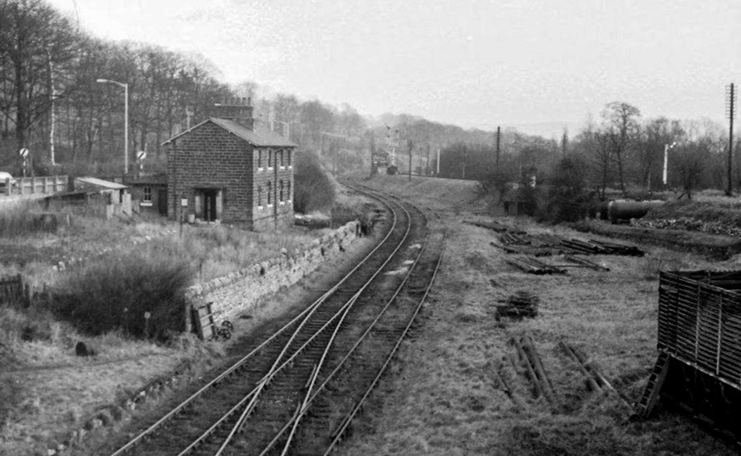 1967c Rowsley North Junction. Dave Walker-Smith comments "Photo taken from the former A6 bridge over the line to the original station-probably during the last year of operation. This view is obscured by trees and unrecognisable now, although the railway houses survive. A corner of one of the cooling tanks of the former Express dairy is just visible to the extreme right." (Courtesy Dave Walker-Smith, from Courtenay Haydon)