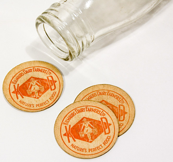 Cardboard bottle tops inscribed with the logo of Kilmaurs Dairy Farmers Ltd. Object No : EAGL007n (Courtesy futuremuseum.co.uk)