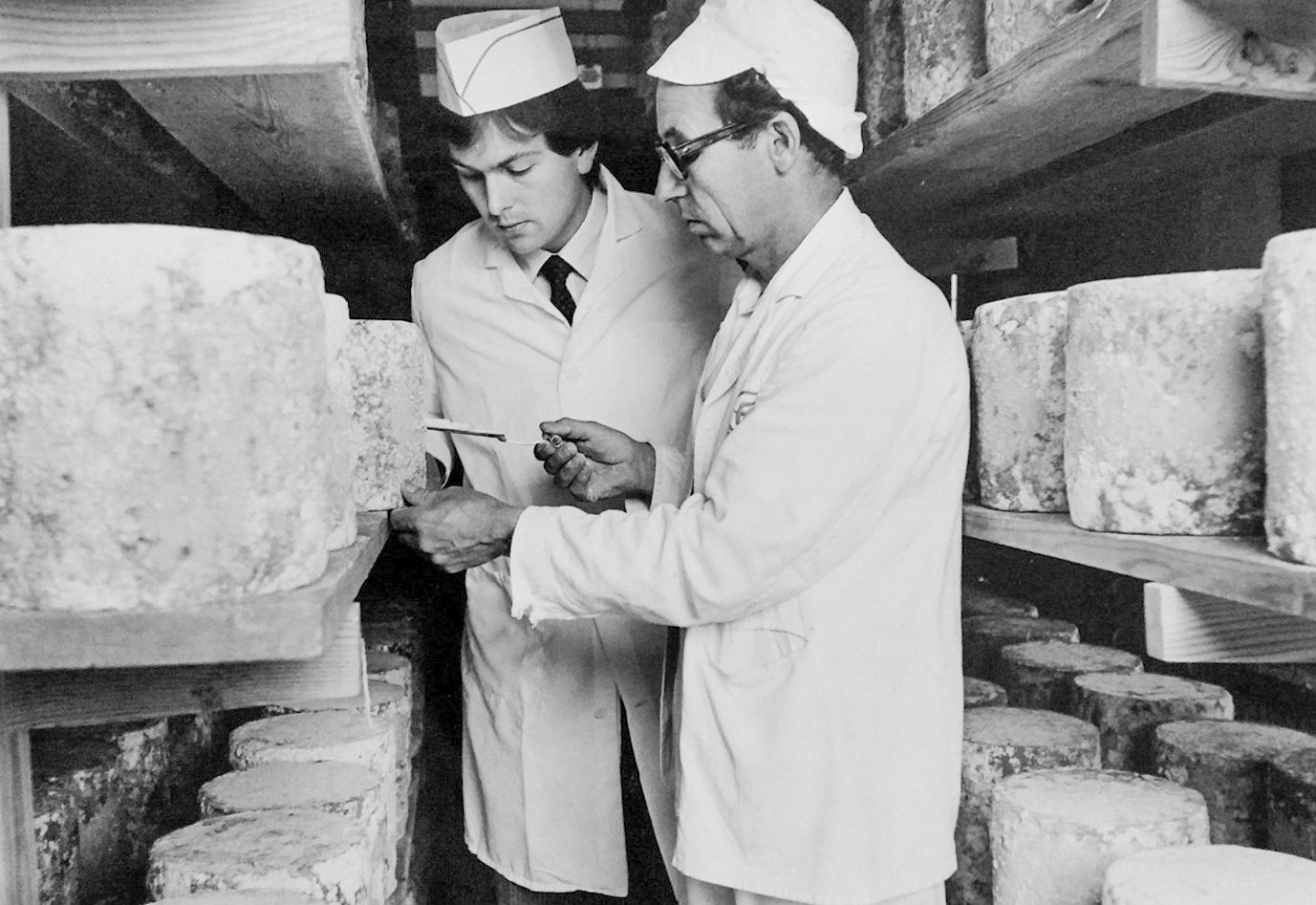 1980's? Denise Jenkins identifies the person taking the sample out of cheese as Barry Harrison.Andy Harrison says "I remember going out with Barry delivering the cheese down London to the markets. Great memories." (Courtesy Denise Jenkins)