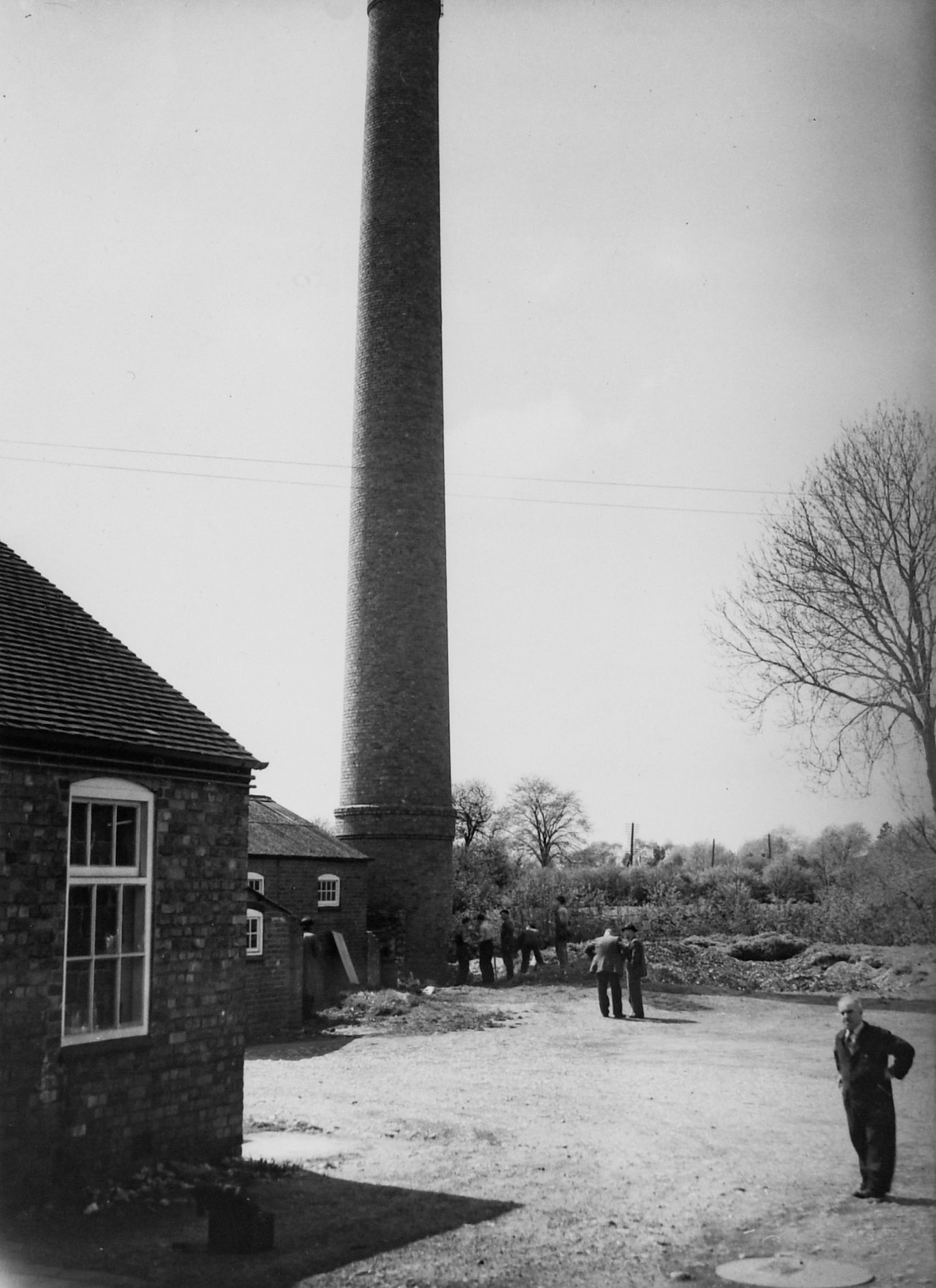 1950's Rowsley Dairy chimney prior to demoliton. (Courtesy Derbyshire Record Office, donated in March 1985; they had previously belonged to the donor's father, who was an electrical engineer with the dairy.)