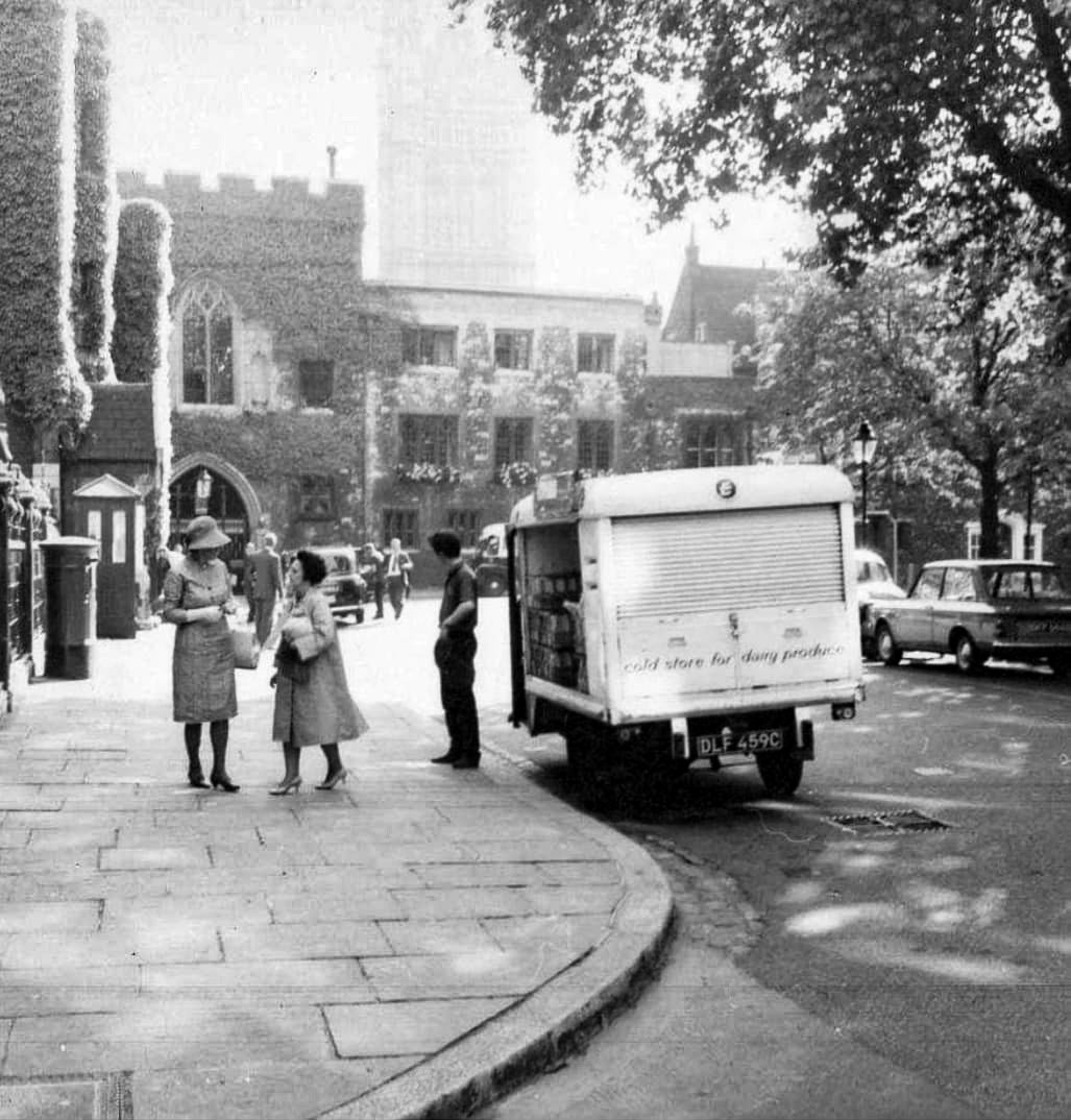1960's Justina McGillivray "My Dad Ken Brown doing his milk round, I was telling Dad about putting his photo on today and he was quite tickled...he's 80 now (in 2024)". C Reg float,1965, probably Bloomsbury. Carl Buttigieg identifies the location as Dean's Yard, behind Westminster Abbey. (Courtesy Justina McGillivray)
