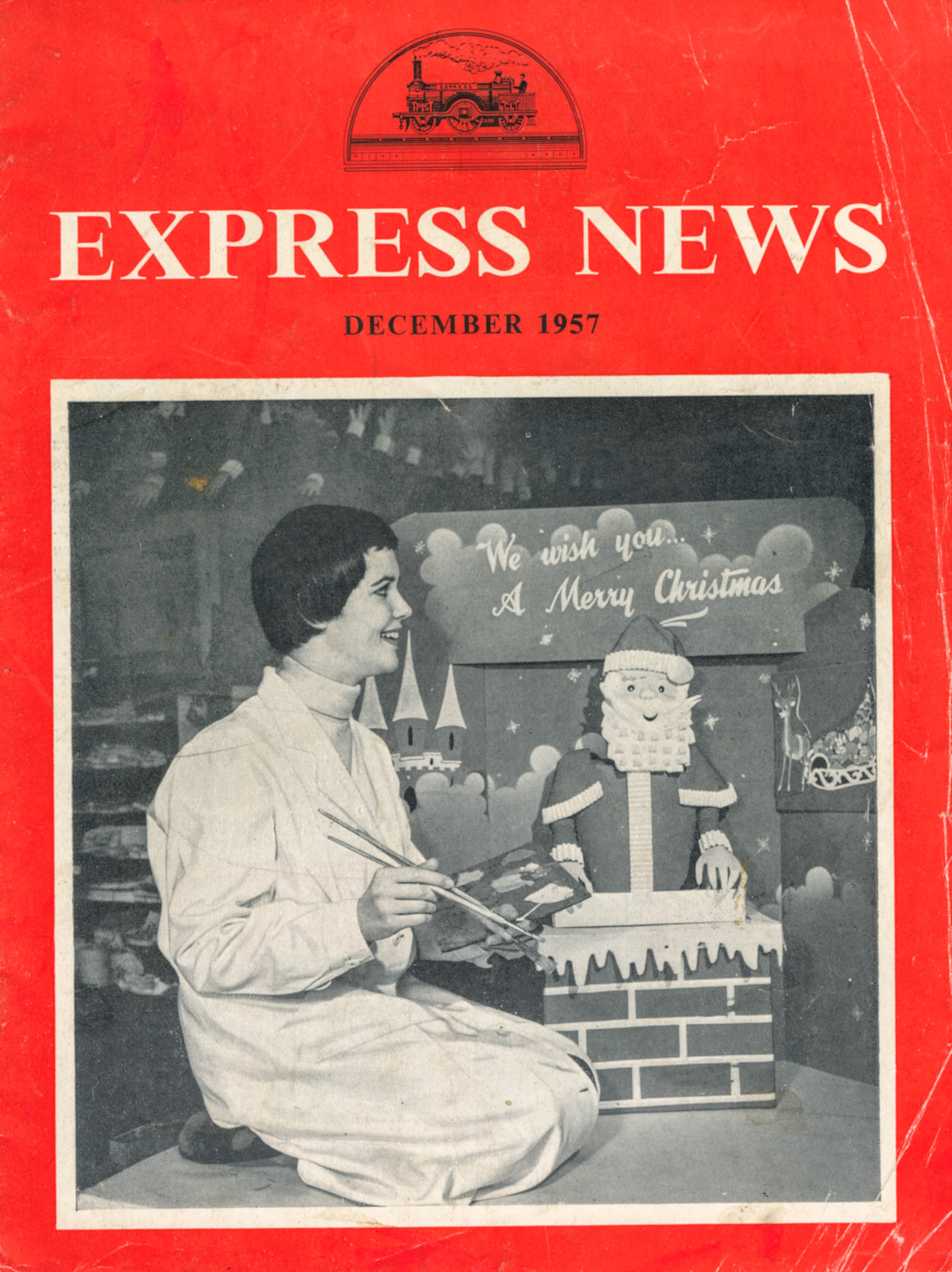 1957 Mrs Patricia Moore of the Window Display Dept (Express News December, Front Cover)