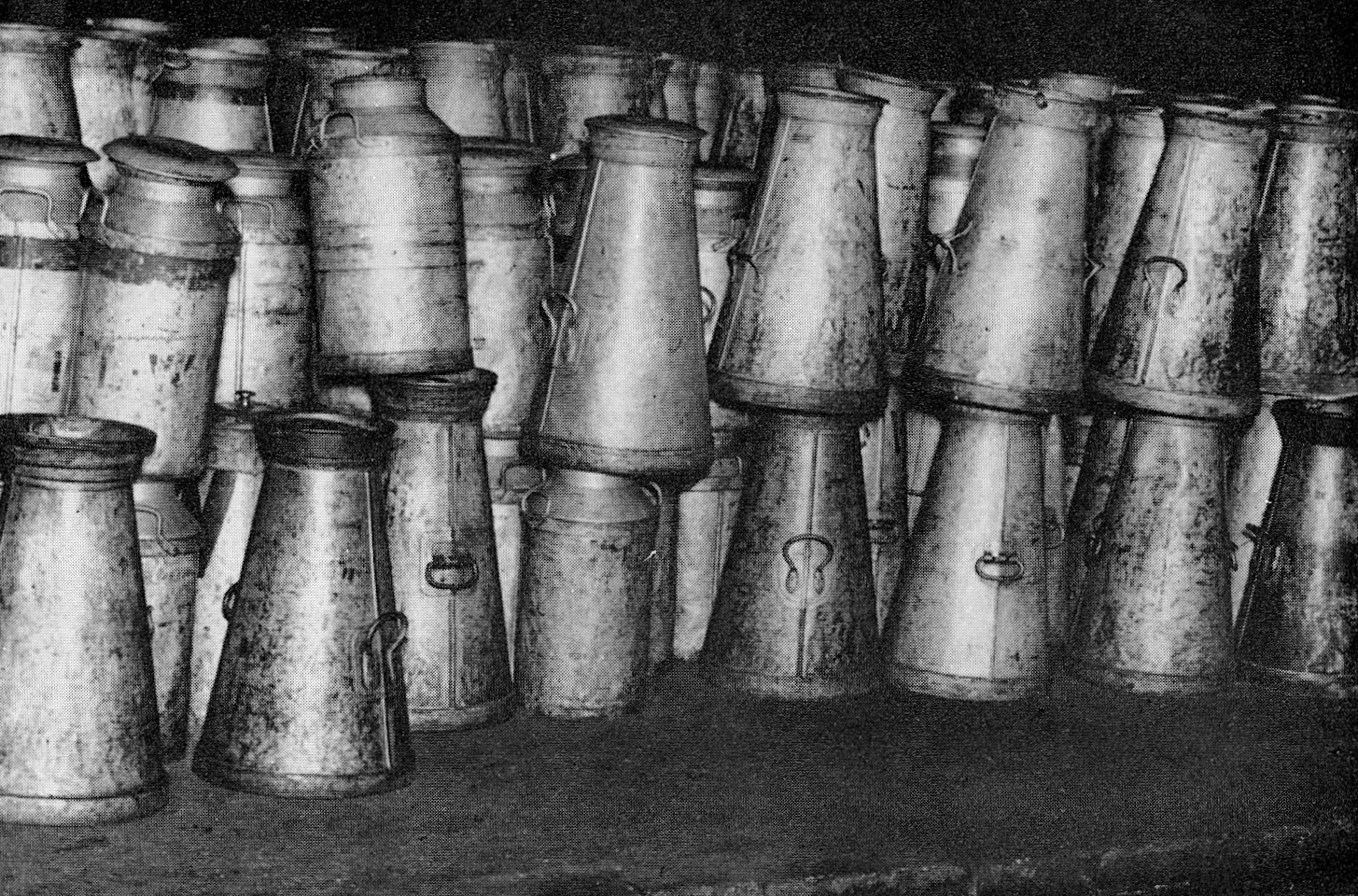 Collection of churns, old and new. Chris Farnham comments "The Ruislip based bulk cream department used to sell churns of cream to bakeries, dairies etc at Christmas in the late 70’s and early 80’s. Nightmare procuring, distributing and then returning to the companies they were hired/leased from." (Express News Spring)