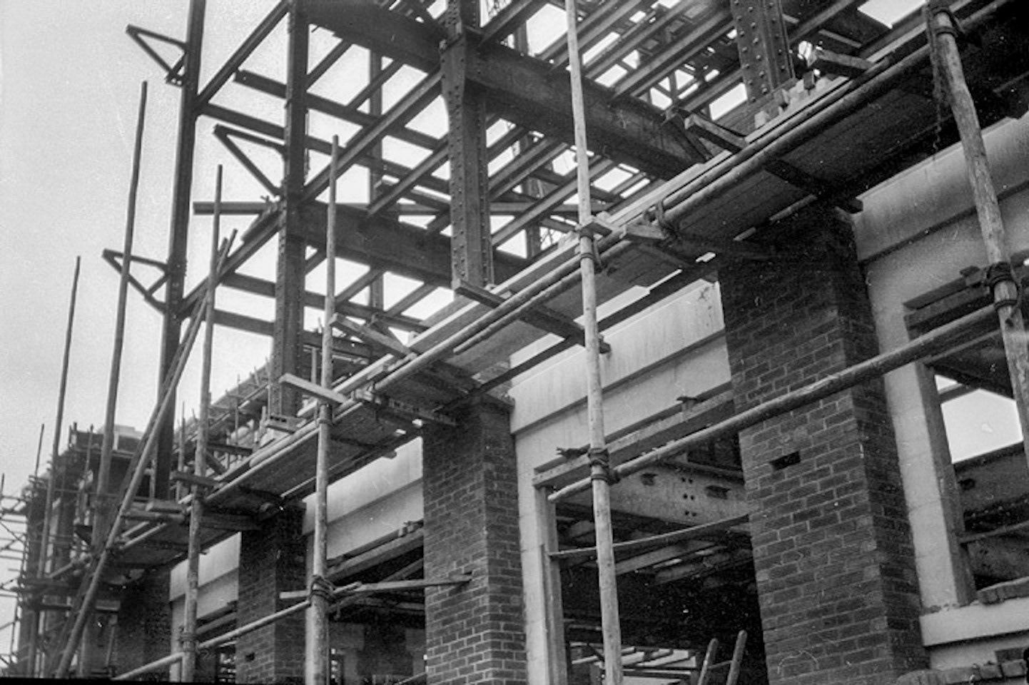 1930's Staplemead. Colin Carpenter comments "Photo found in an undeveloped film found in an old camera that shows the construction of the core building in, I would think, the 1930s judging by the dress of the worker shown. Amazing that they did so much with such little scaffolding in those days; rivetted RSJ's, cut Bath stone and brickwork would cost a fortune these days." (Courtesy Colin Carpenter)
