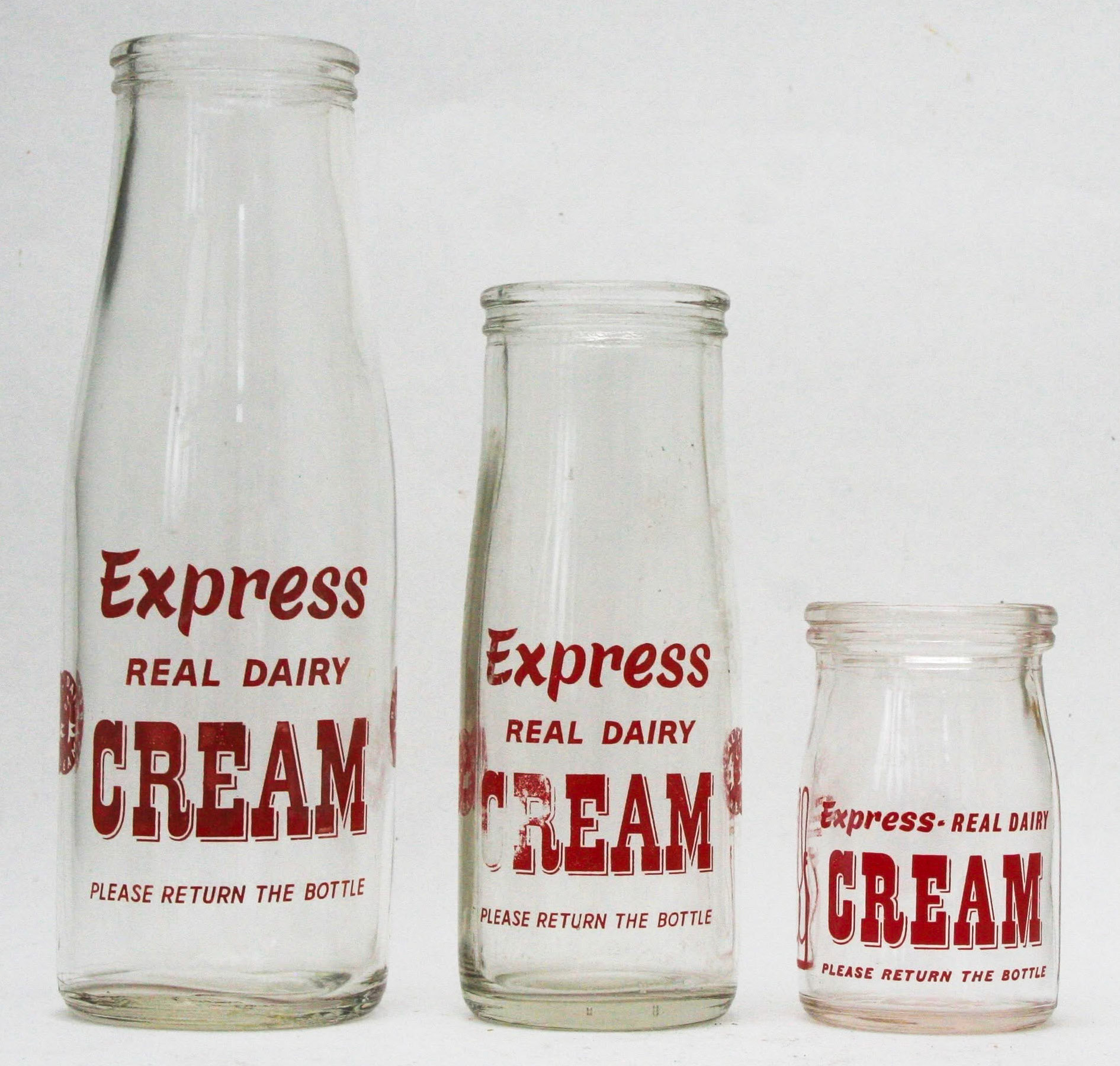 1950s? Enamelled, wide-neck cream bottles. (Courtesy Paul Smith)