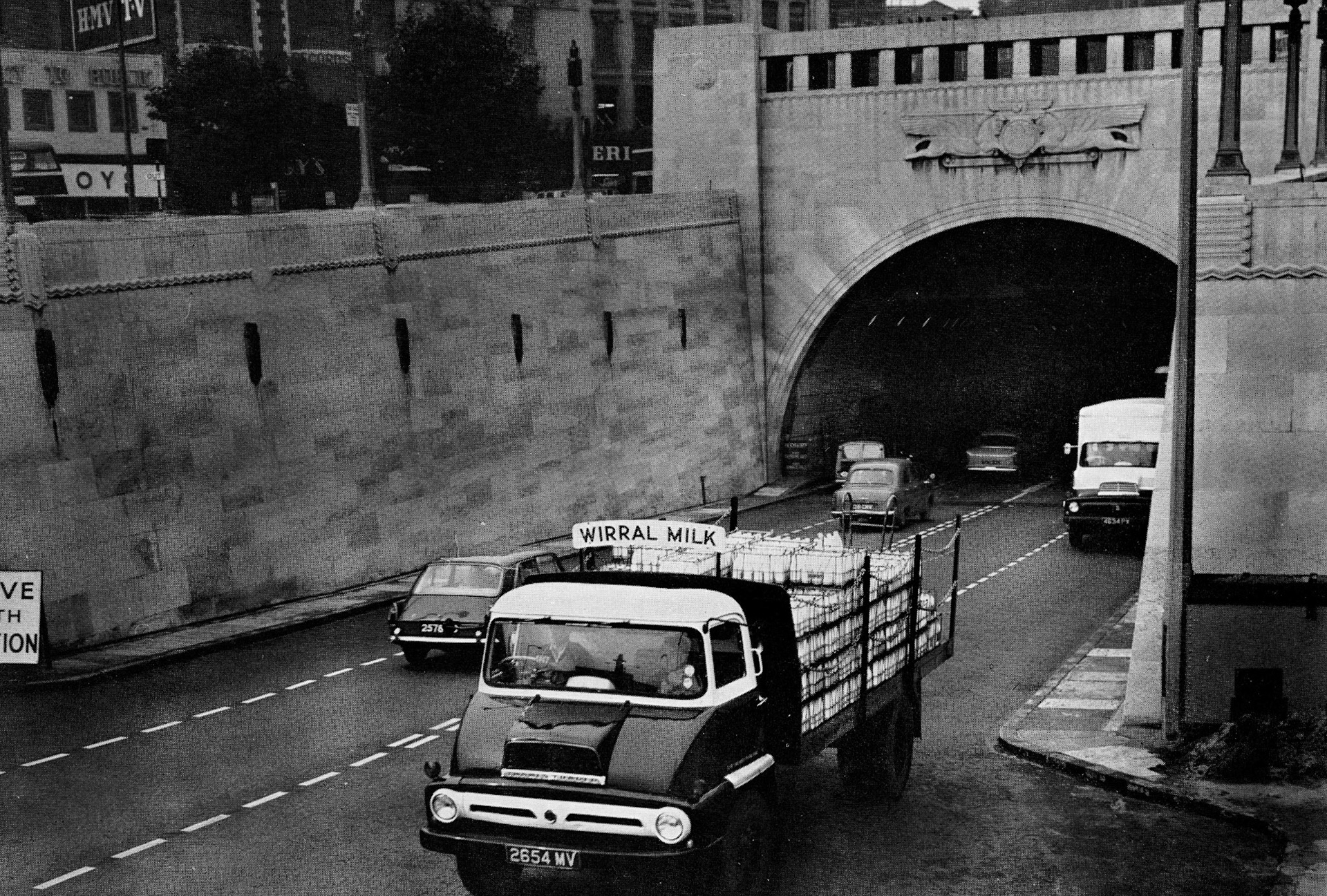 1962 Wirral Milk Supplies truck leaves the Mersey Tunnel.