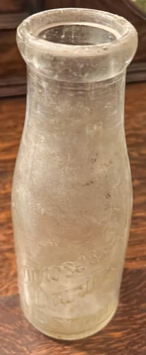 1900's Primrose and Len bottle. John Hakeman comments "My best mate Peter used to help our local P&L milkman on Saturdays in the early ‘60s. I stood in for him when Peter was on holidays. The old milky was known as 'The General'! He was a right character shouting out directions in a nice way though. 2 pints for no 6, 1 pint of gold top for number 8, etc etc. He was just like Clive Dunn, Corporal Jones in 'Dads Army'. (Courtesy John Hakeman)
