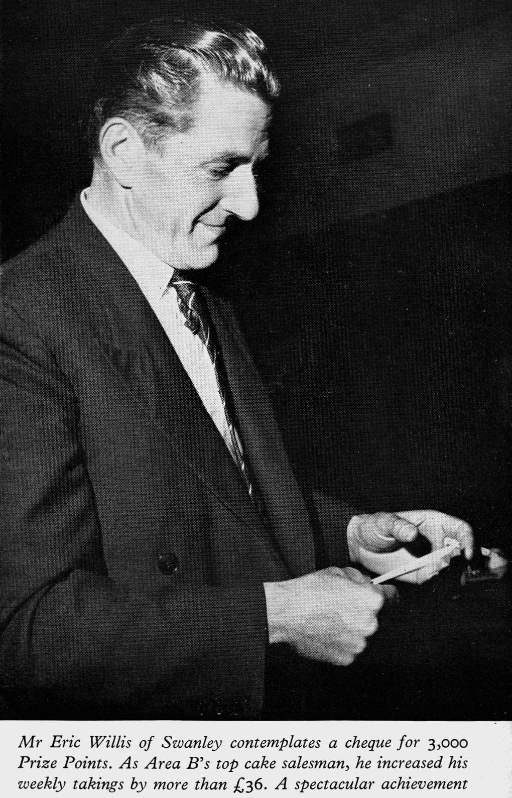 1962 Eric Willis from Swanley collects his cheque.  (Express News Christmas)