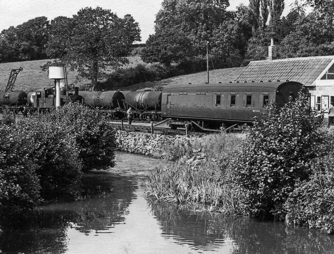 1950s? Hemyock, Devon-"A single carriage waits at the platform. Amyas Crump comments "Another from Edgar’s Lowmans set."Express only did egg packing at Hemyock, the dairy later became St Ivel. (Courtesy Discovering Devon, Somerset and beyond FB)
