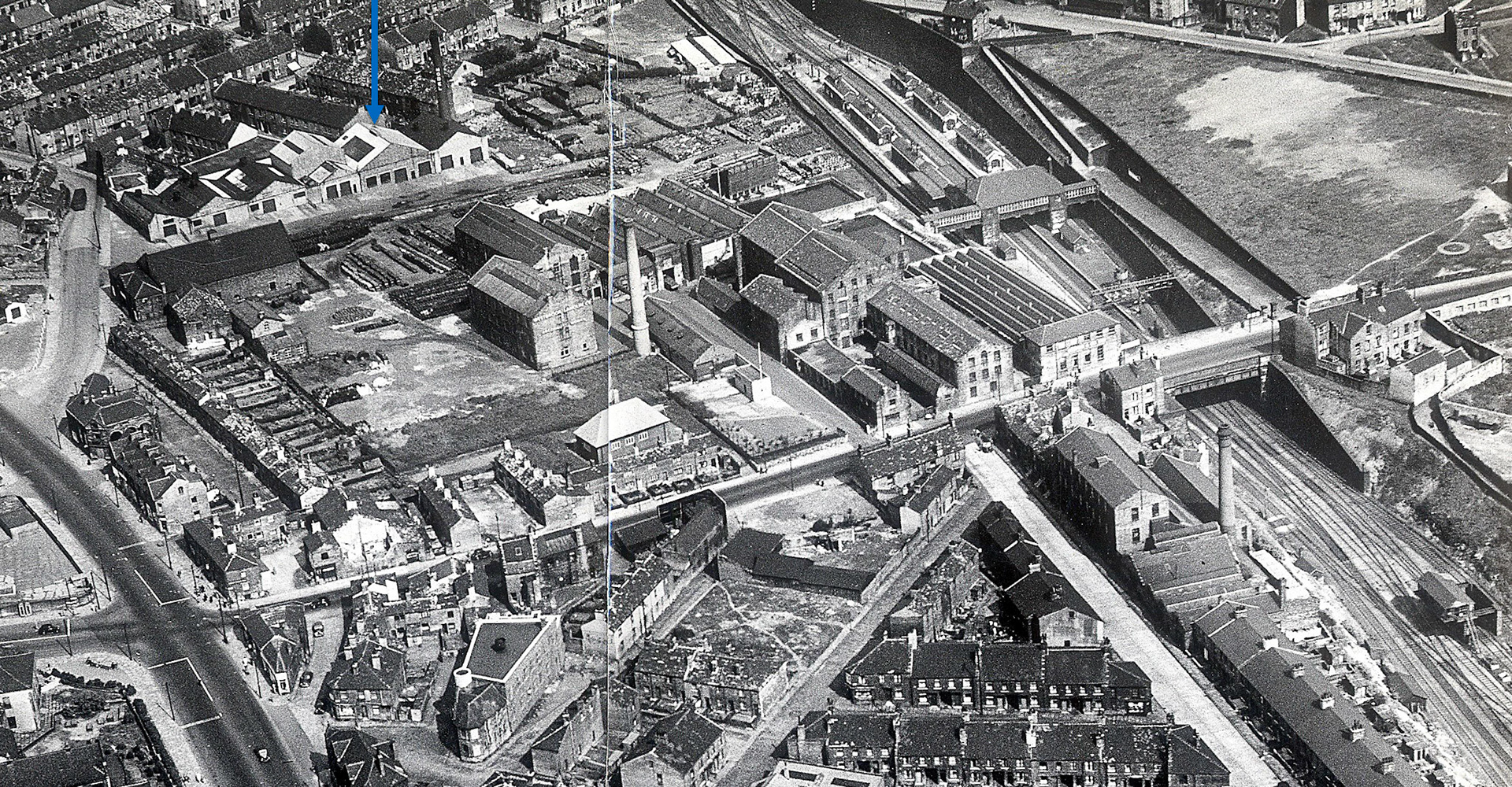 1954 Aerial shot of Laisterdyke, Bradford, with Bradford Model Dairy arrowed, 'Model' on the chimney. The bottling plant opened in 1926 and was acquired by Express in the 1950's; a new dairy was opened in 1951. (Courtesy Matthew Pinto, Milk on the Rails, Photo: C.H. Wood)