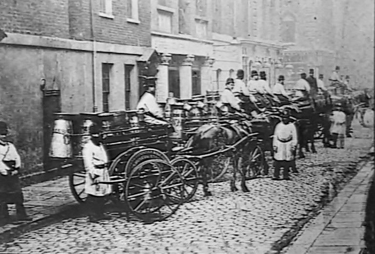 1864 George Barham formed the Express Country Milk Supply Company by King's Cross station, and started bringing fresh milk to London. (Express 125 Years video still)