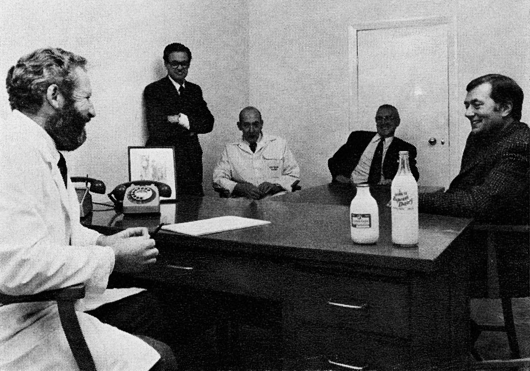 1976 Bryce Benson with his management team, L-R: plastic sales enthusiast John Woodhall, dairy chief Syd Mason, shop sales king Alan Stead, and office boss Tom Battersby. (Express News Christmas)