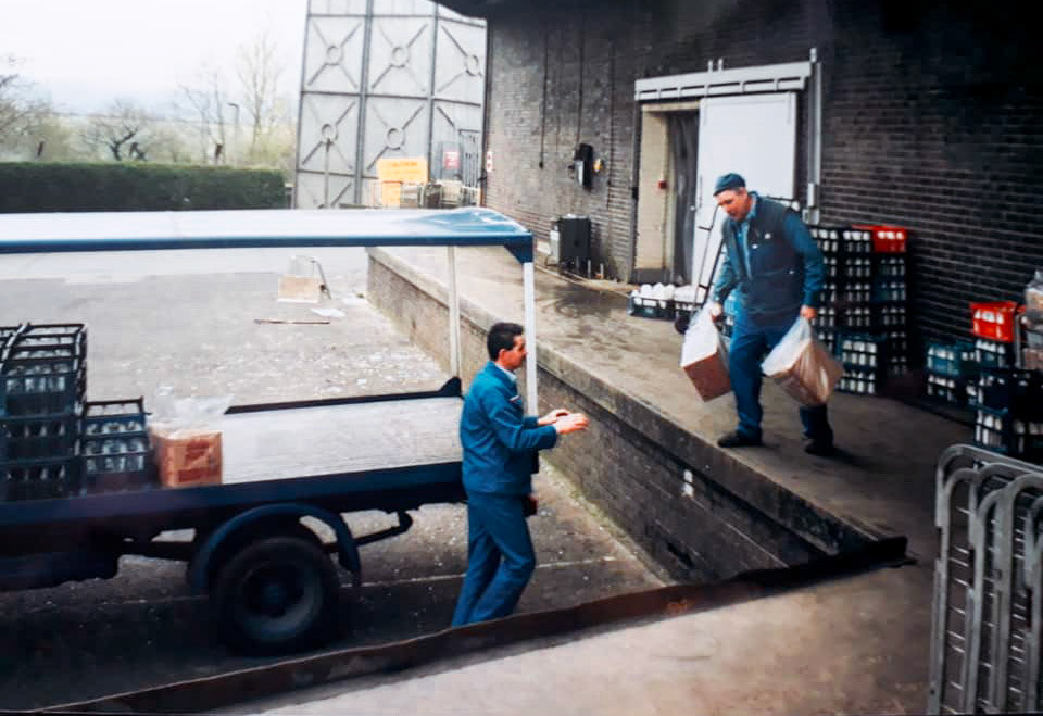 Tarvin John Glaister comments "Stuart Harper loading 3 gallon Pergals on van with Dave Waring" (Identified by Jan Waring). (Courtesy John Glaister, Old Tarvin FB Group)