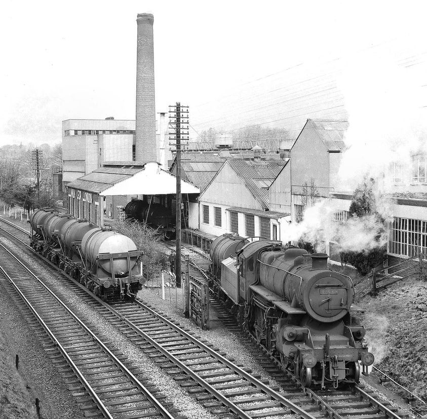 1965 Appleby Rail Siding. Matthew Pinto comments "This image was taken by Gerald T Robinson. At this date most milk at Appleby was inbound for cheese production." James Ayres comments "The locomotive is an LMS Class 4 designed by George Ivatt built between 1947 and 1952 mainly for light freight work. The characteristic high running-plate was a deliberate decision to aid with cleaning and maintenance."(Courtesy Iain Dargue)
