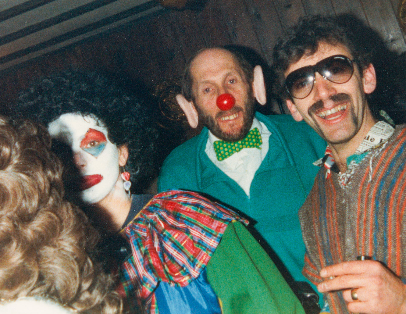 1988 Honiton staff (Linda &amp; Roger ?, Derek Carter) celebrate the first Red Nose Day, Fountain Head Inn, Branscombe, Devon. (Courtesy Tim Pearce)