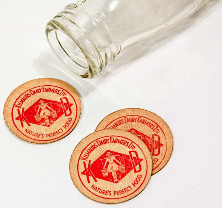 1950s? Cardboard bottle tops inscribed with the logo of Kilmaurs Dairy Farmers Ltd. Object No : EAGL007n (Courtesy futuremuseum.co.uk)
