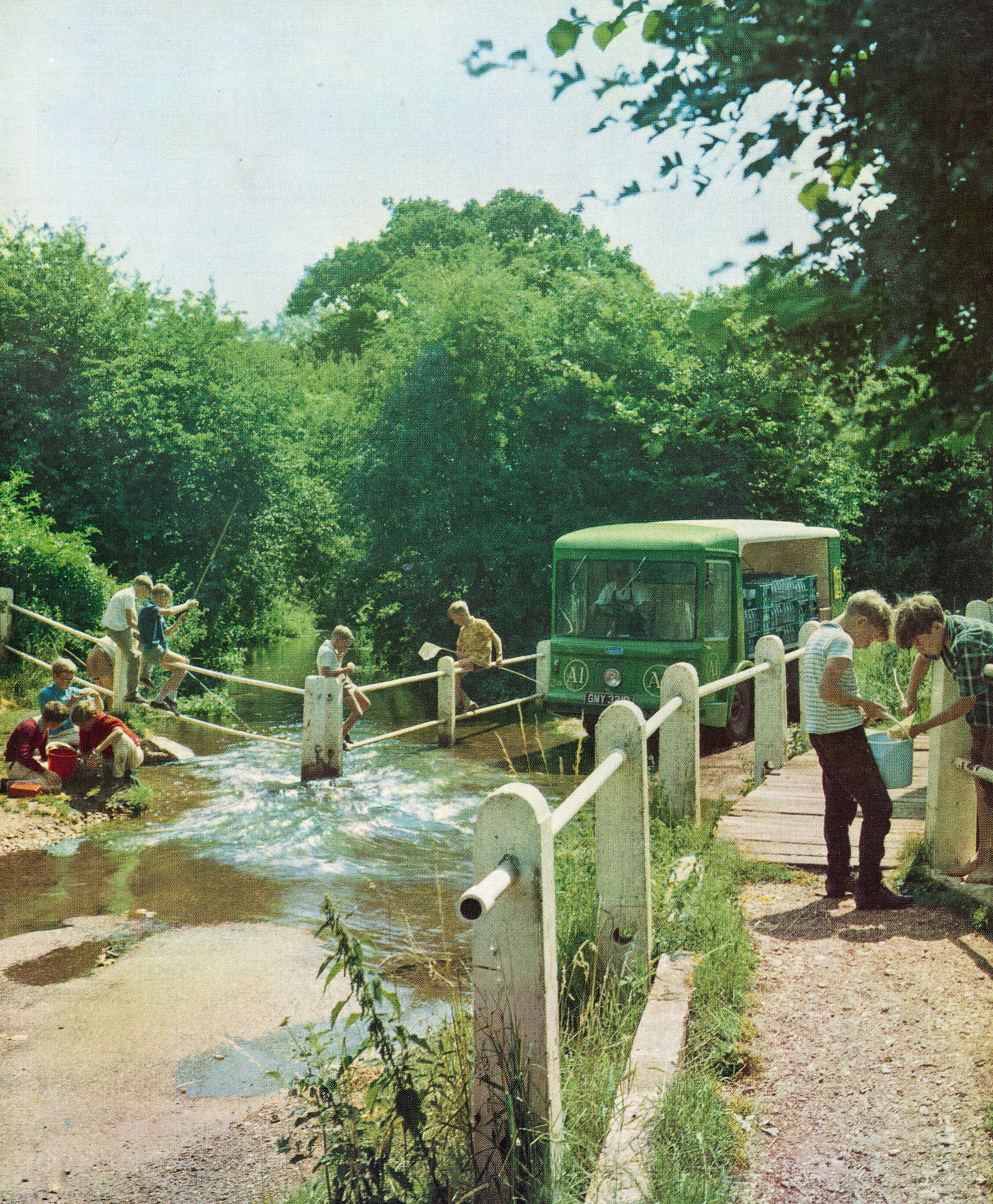 1967 A1 Dairies, with 60,000 customers in North London and Herfordshire, joins Express - Morrison Electric negotiates a ford near Welwyn Garden City.Robert Gayton comments "This photo looks suspiciously like the ford in Fulling Mill Lane, Welwyn and close-by to where I live, some 20 miles north of Whetstone. Did the A1 Dairy really have a round that came this far out? 40 miles there and back plus the round to do without the battery conking-out? I can't quite believe it. It must be a publicity picture." Robert posts a picture of how it is now: https://www.facebook.com/photo.php?fbid=10226057156907718&set=p.10226057156907718&type=3
