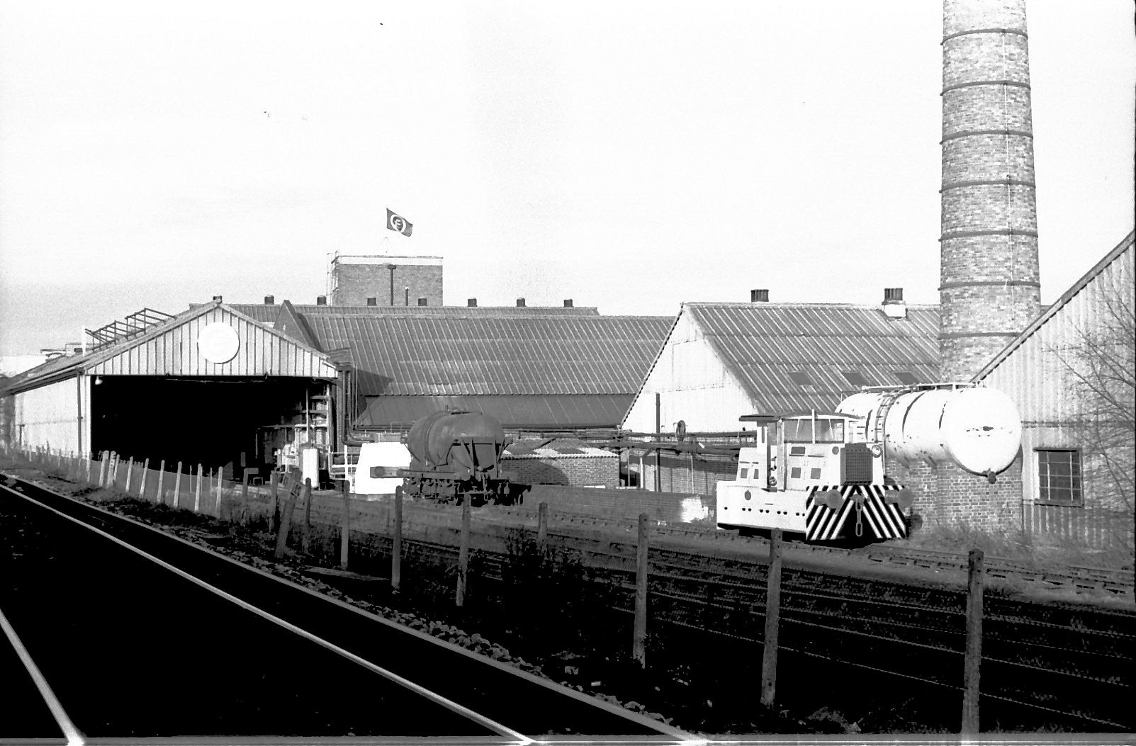 1970's South Morden dairy rail siding-'David' by oil storage tank - tanker at end of same siding