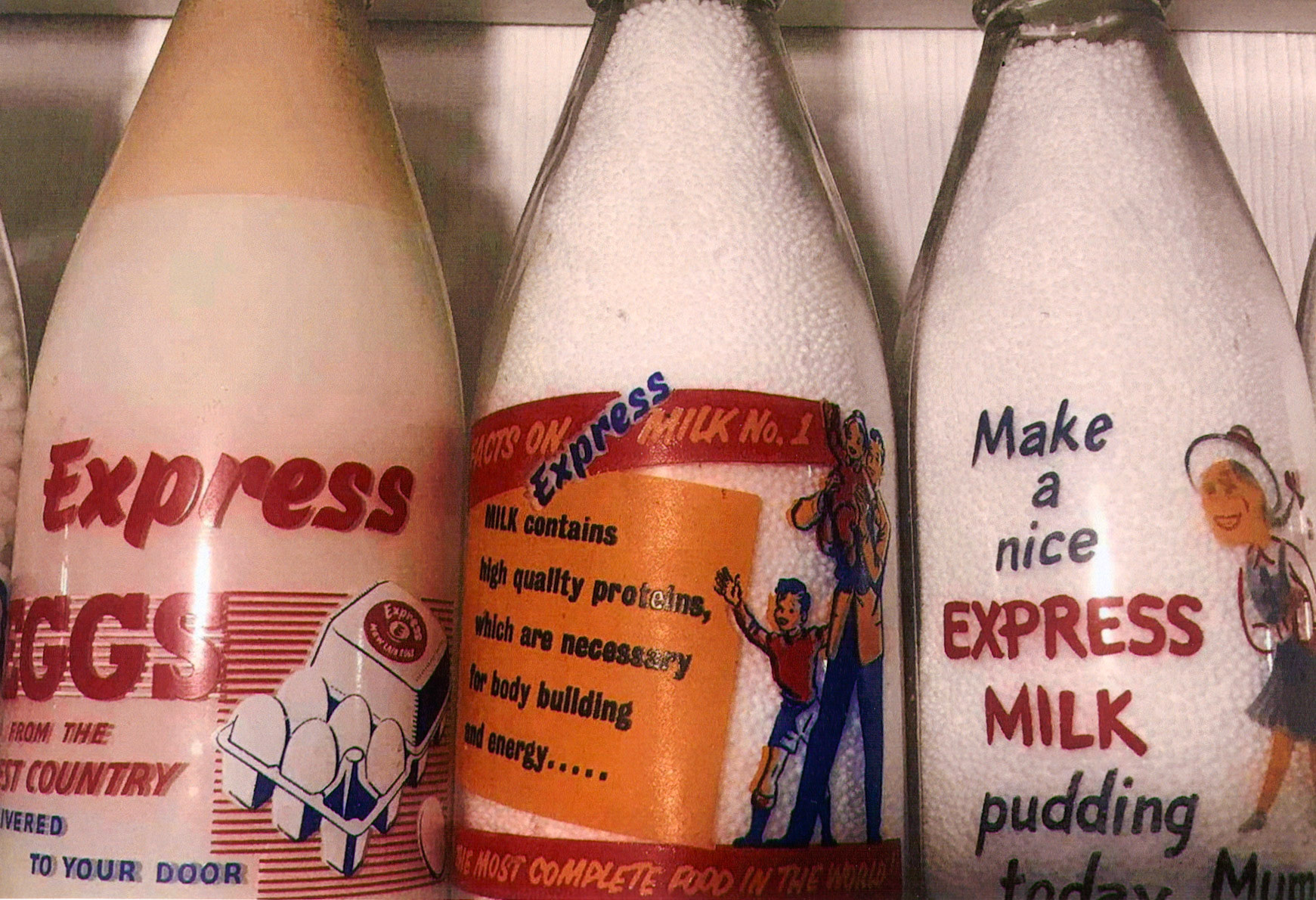 1950's? Express enamelled bottles (Courtesy Dave Fane)