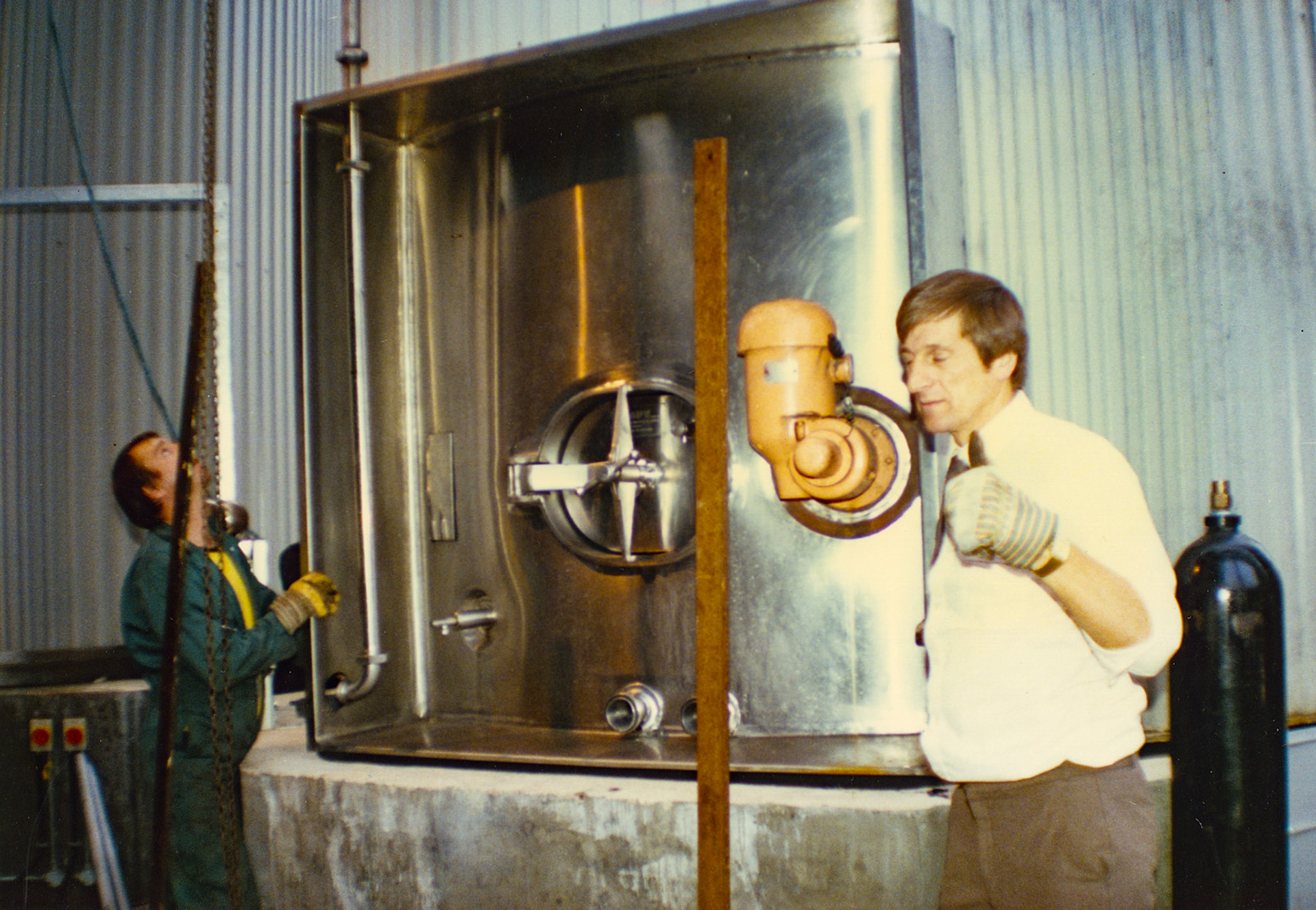 1980s Exeter Processing-silo and milk reception construction. Jimmy Reid identifies, LHS, Melvin Walrond, fitter. (Pictures by Syd Johnston, presented by his son Ian via Teresa Heal)