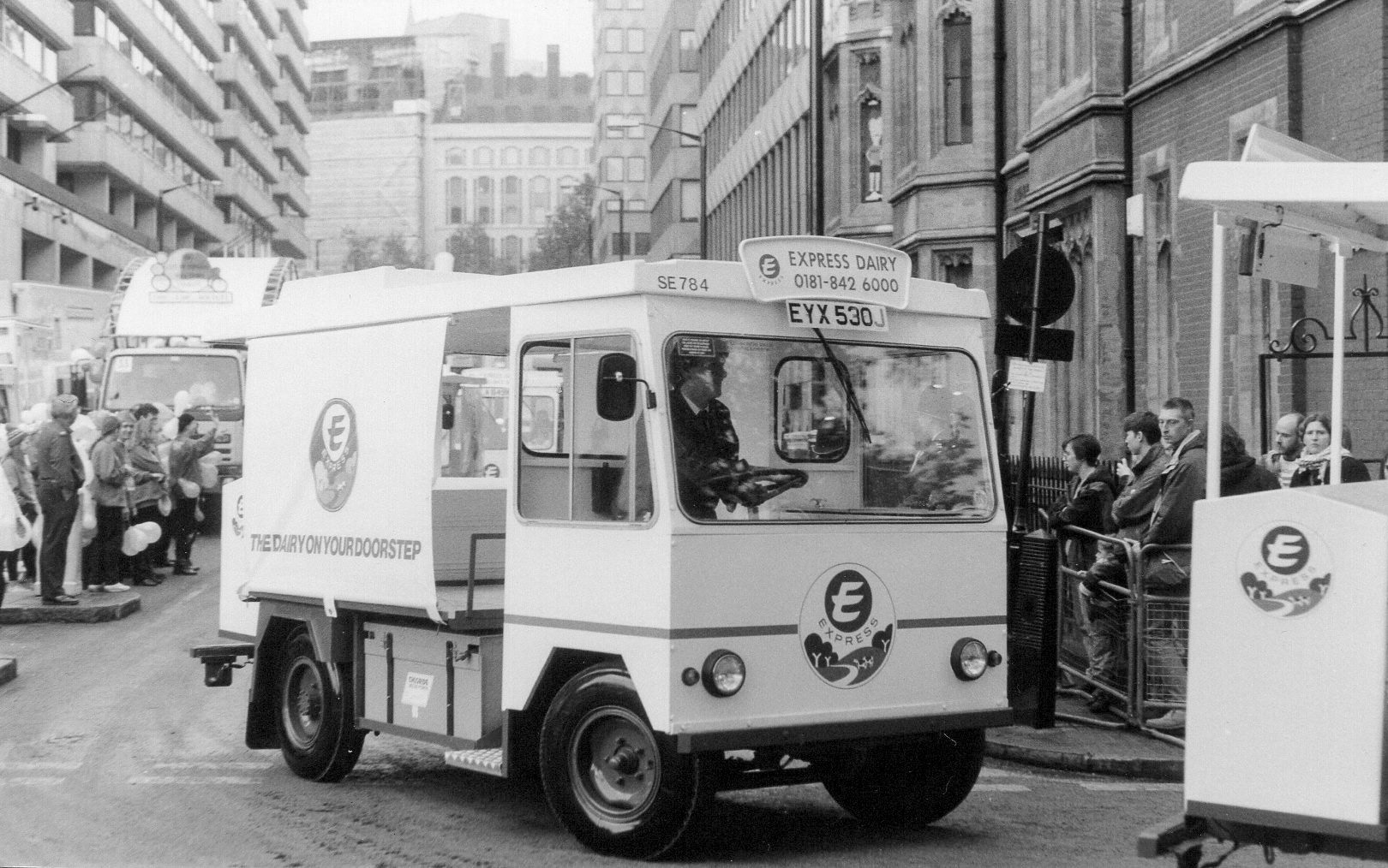 1980's Lord Mayor's Show, City of London, with Reg: Q501 FLE, Fleeet WM 76. Michael Aldread driving the truck. Eamonn Fay adds "All floats were from Bloomsbury, and Lorries from Nine Elms. There were about 10 milkman dragging an inflatable giant bottle of milk around the City, it must have been 100ft long!" (Courtesy Michael Aldread)