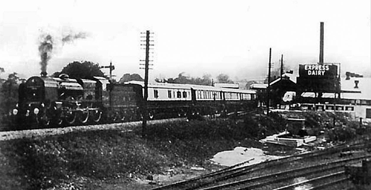 1933 Rowsley Creamery. Alan Salt comments "All long gone, the new shopping village is just to the left nowadays." Bill Conquest comments "The Royal Family had just visited Chatsworth in July 1933". (Courtesy Alan Salt)