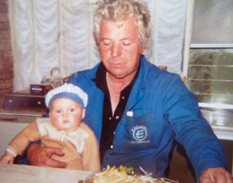 1983 Minsterley. Gordon Ruff on his lunch break in his uniform. Debbie Llewellyn comments "That is Daniel his grandson. I'm his mum." (Courtesy Lorraine Fletcher)