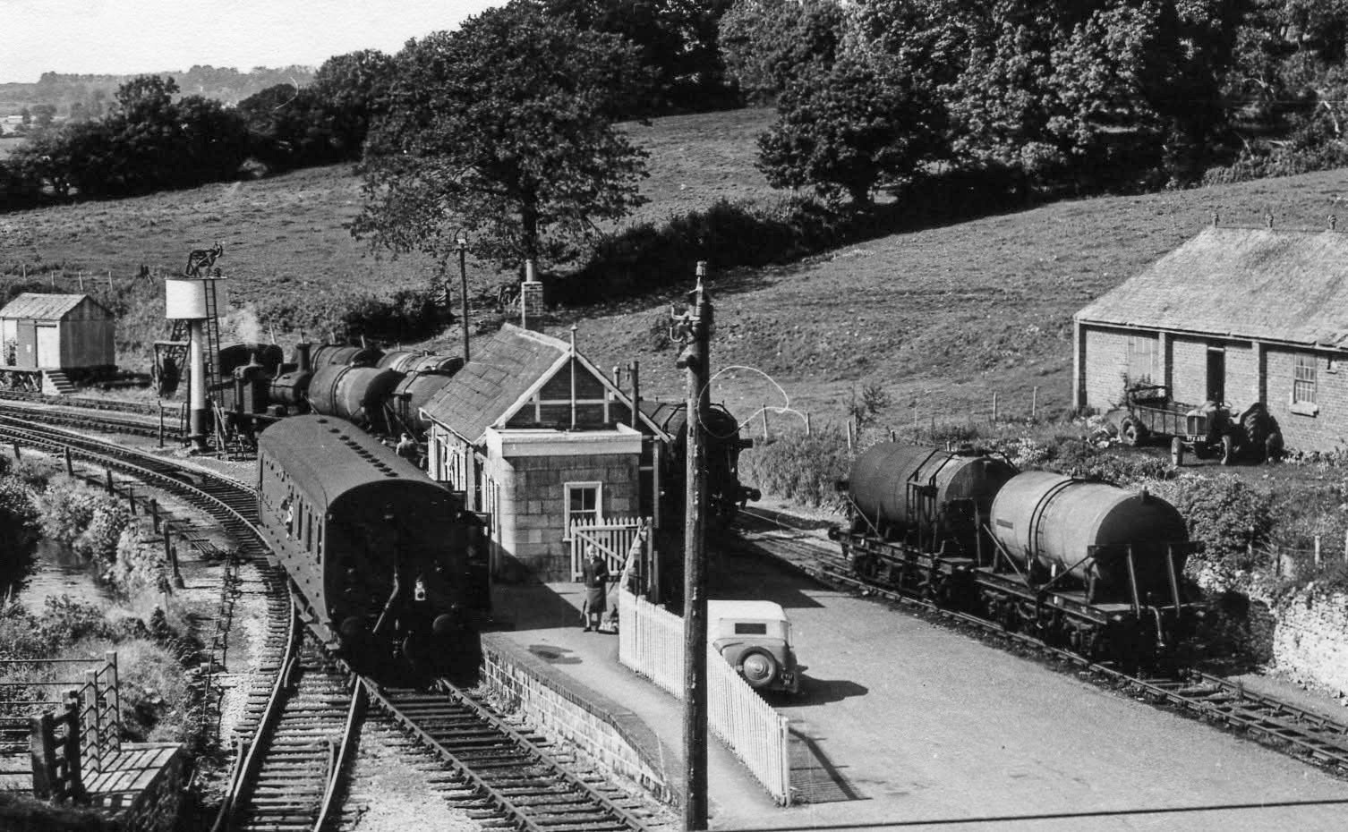 1950s? Hemyock, Devon-"Looking back to the station, from Station Road." Amya's Crump comments "Edgar Lowman photo, from the top of the creamery oil storage tanks." Express only did egg packing at Hemyock, the dairy later became St Ivel. (Courtesy Discovering Devon, Somerset and beyond FB)