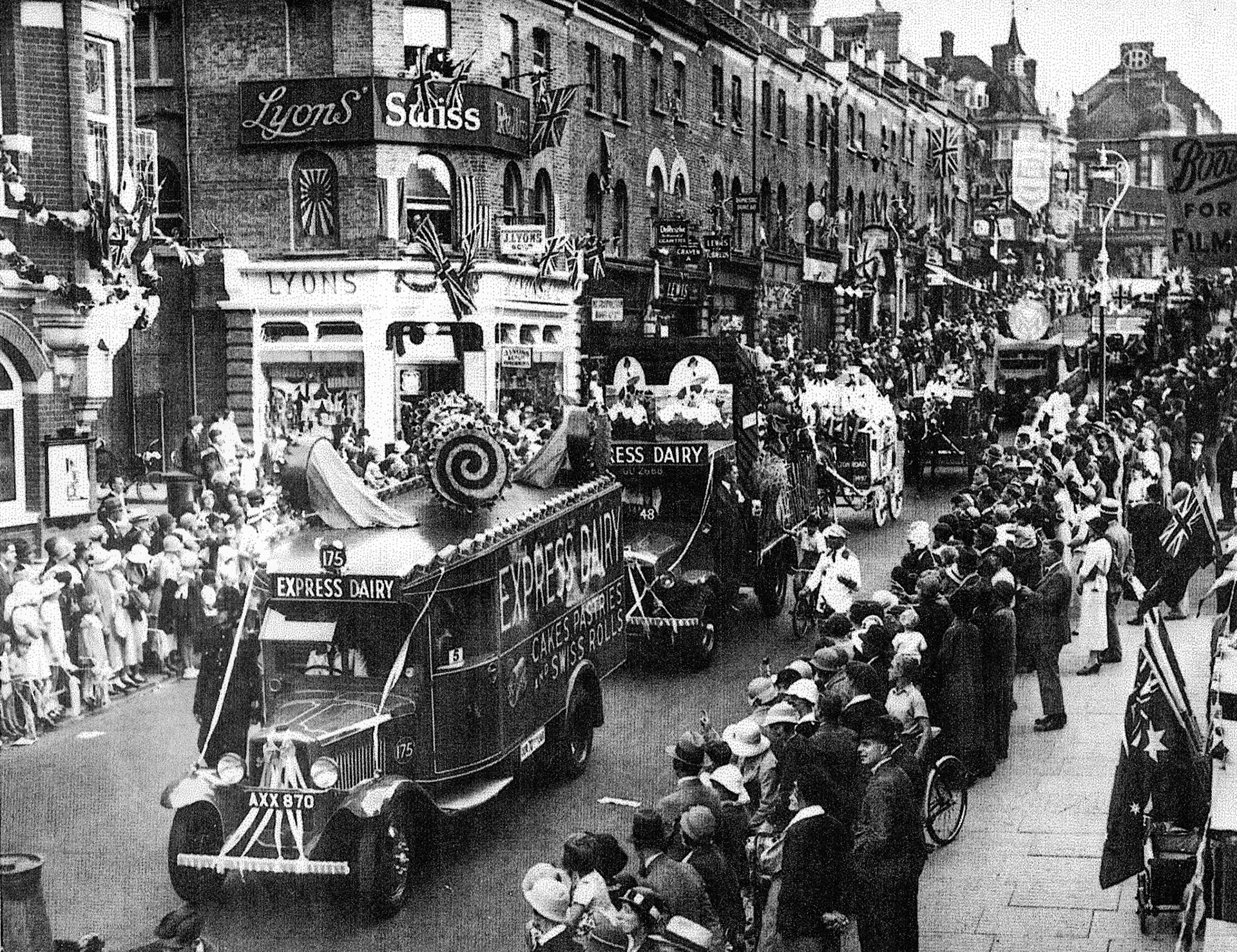 1934 Sutton Charter Day procession. (12th September). On that day, Sutton and Cheam received the Charter promoting it from an Urban District to a Borough. On the corner of Throwley Road is the former well-known landmark, Joe Lyons, and on the right is Boots' old shop. (Courtesy Dave Fane)